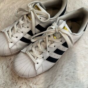 Adidas women’s White and Navy Sneakers with Gold Accents